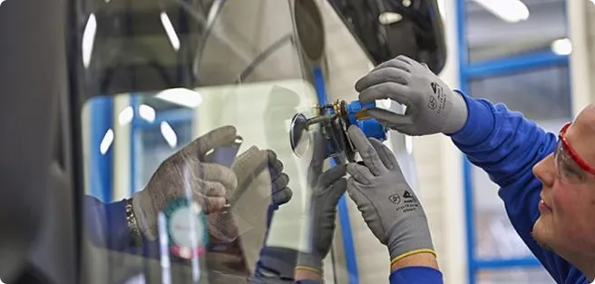 Man fixing a truck window